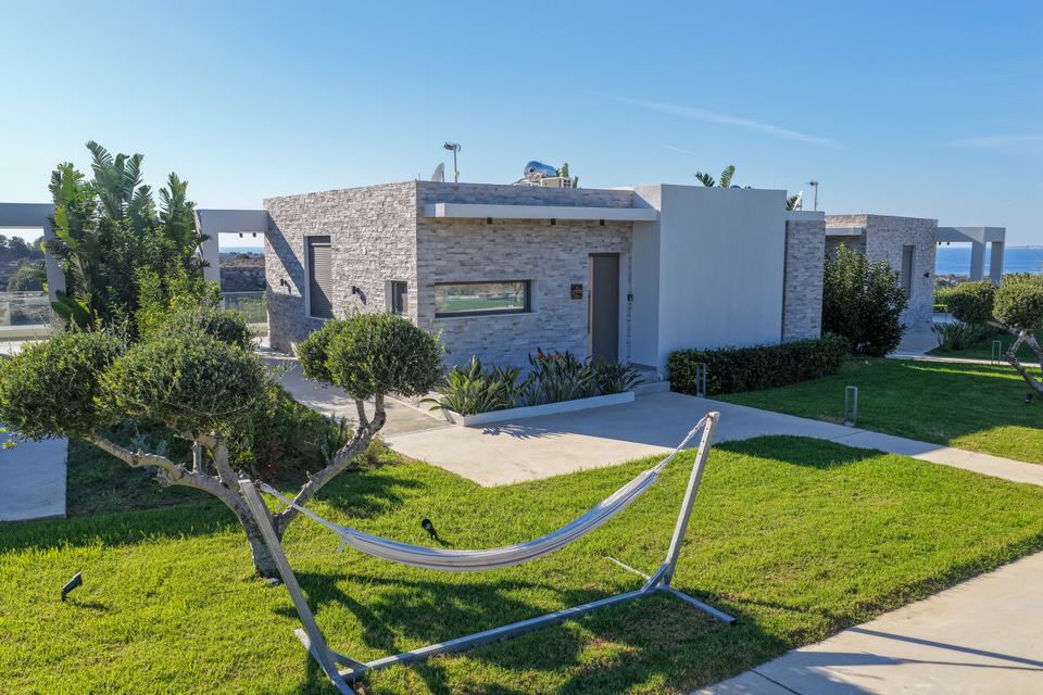 A hammock on the lawn between the villas, seen from the air